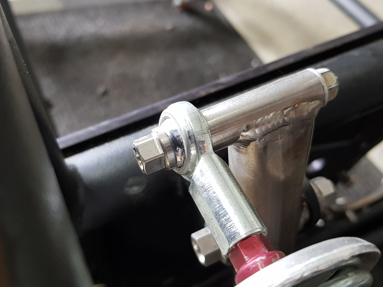 Master cylinder to brake pedal